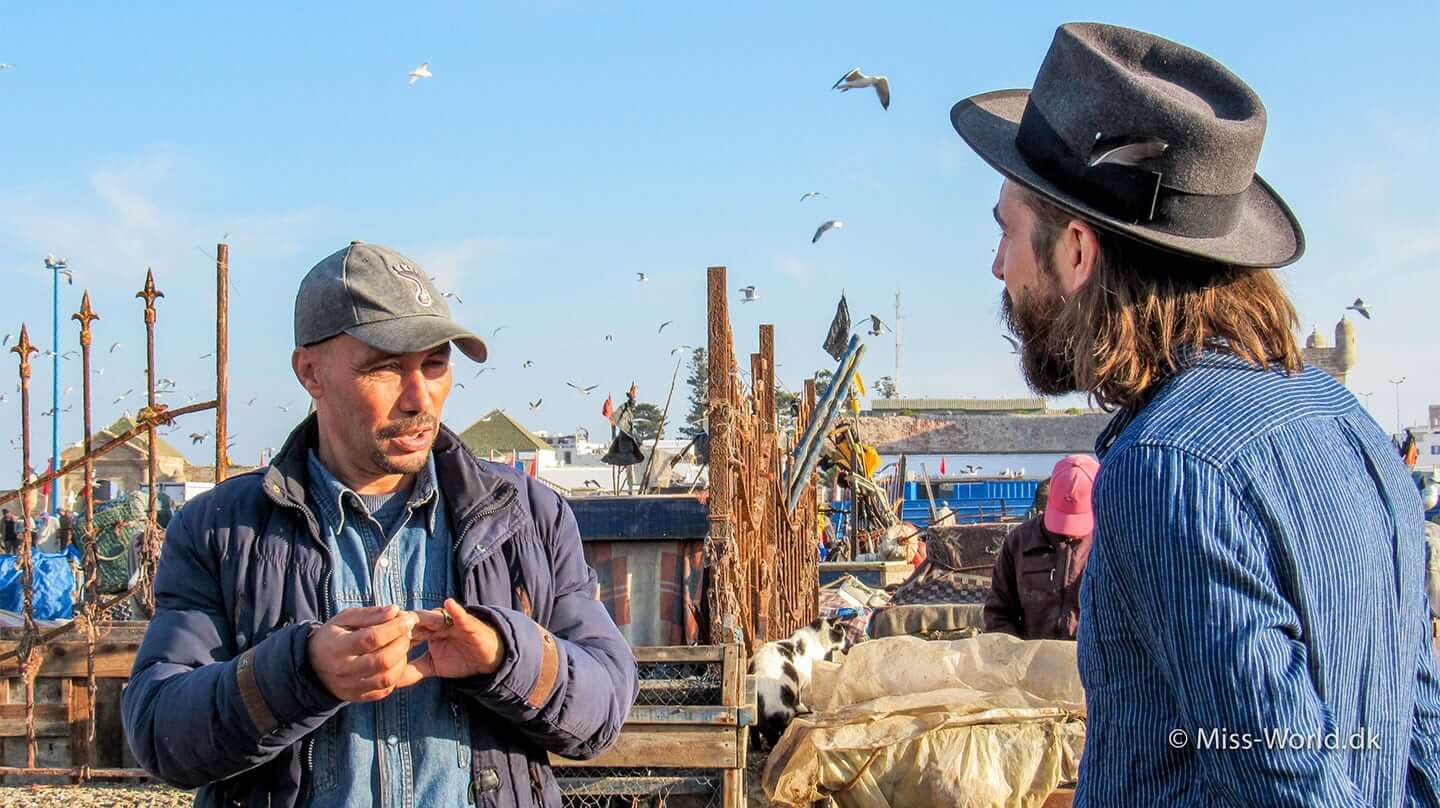 Essaouira Fishing Port. Anthony Bogdan is having a chat with a local fisherman